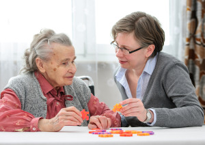 Senior Woman With Her Elder Care Nurse